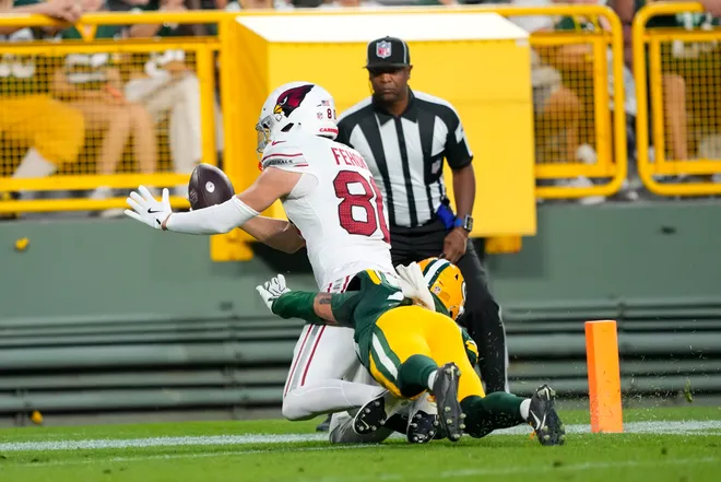 Aug 28, 2026; Green Bay, Wisconsin, USA;  Arizona Cardinals wide receiver Simi Fehoko (80) scores a touchdown during the second quarter against the Green Bay Packers at Lambeau Field. Mandatory Credit: Jeff Hanisch-Imagn Images