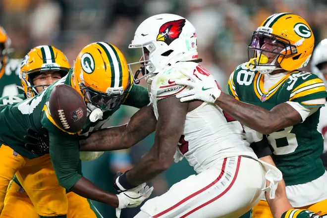 Aug 28, 2026; Green Bay, Wisconsin, USA;  Green Bay Packers safety Murvin Kenion III (39) breaks up the Hail Mary pass intended for Arizona Cardinals tight end Rivaldo Fairweather (45) during the fourth quarter at Lambeau Field. Mandatory Credit: Jeff Hanisch-Imagn Images