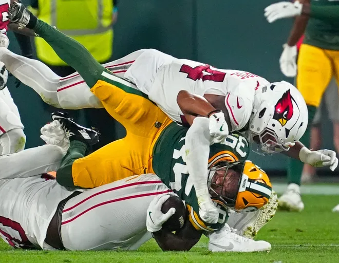 Green Bay Packers running back Jaden Nixon (35) is tackled by Arizona Cardinals linebacker Owen Pappoe (44) during their preseason football game Friday, Aug. 28, 2026, at Lambeau Field in Green Bay, Wisconsin. The Packers defeated the Cardinals 42-38.
Wm. Glasheen/Appleton Post-Crescent