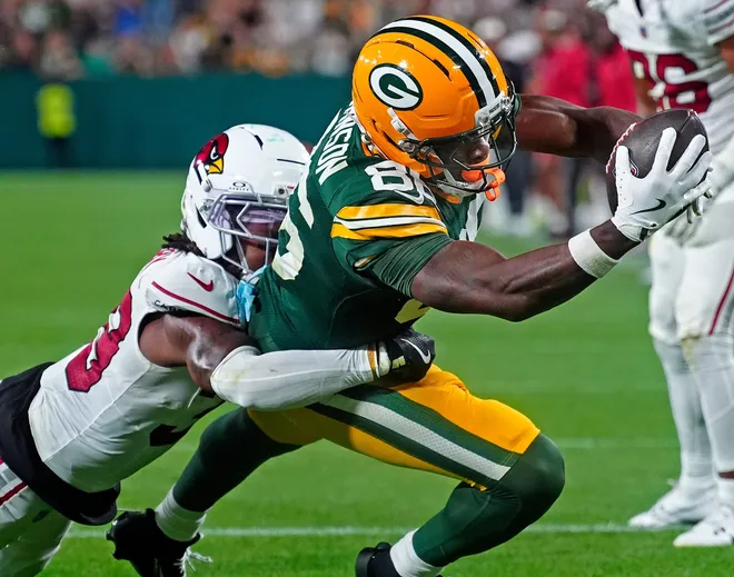 Green Bay Packers wide receiver Kisean Johnson (86) dives for a late fourth quarter touchdown against the Arizona Cardinals wide receiver Bryson Green (39) during their preseason football game Friday, Aug. 28, 2026, at Lambeau Field in Green Bay, Wisconsin. The Packers defeated the Cardinals 42-38.
Wm. Glasheen/Appleton Post-Crescent