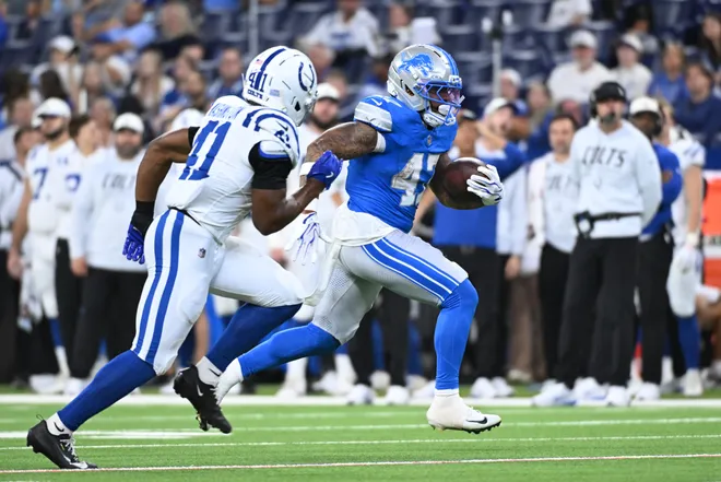 Aug 29, 2026; Indianapolis, Indiana, USA;  Detroit Lions running back Trayveon Williams (47) runs with the ball against the Indianapolis Colts during the second half at Lucas Oil Stadium.  Mandatory Credit: Robert Goddin-Imagn Images