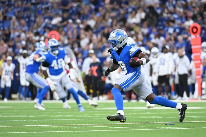 Aug 29, 2026; Indianapolis, Indiana, USA;  Detroit Lions wide receiver Greg Dortch (8) runs with the ball against the Indianapolis Colts during the second half at Lucas Oil Stadium.  Mandatory Credit: Robert Goddin-Imagn Images