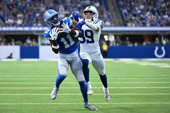 Aug 29, 2026; Indianapolis, Indiana, USA;  Detroit Lions wide receiver Lucky Jackson (11) makes a catch against Indianapolis Colts cornerback Rob Carter Jr. (39) during the first half at Lucas Oil Stadium.  Mandatory Credit: Robert Goddin-Imagn Images