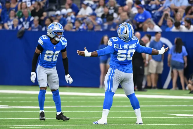 Aug 29, 2026; Indianapolis, Indiana, USA;  Detroit Lions defensive tackle Skyler Gill-Howard (50) celebrates with running back Jabari Small (26) after a play against the Indianapolis Colts during the first half at Lucas Oil Stadium.  Mandatory Credit: Robert Goddin-Imagn Images