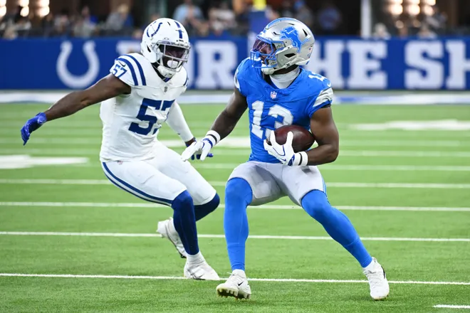 Aug 29, 2026; Indianapolis, Indiana, USA;  Detroit Lions tight end Jackson Meeks (13) runs with the ball against the Indianapolis Colts during the first half at Lucas Oil Stadium.  Mandatory Credit: Robert Goddin-Imagn Images