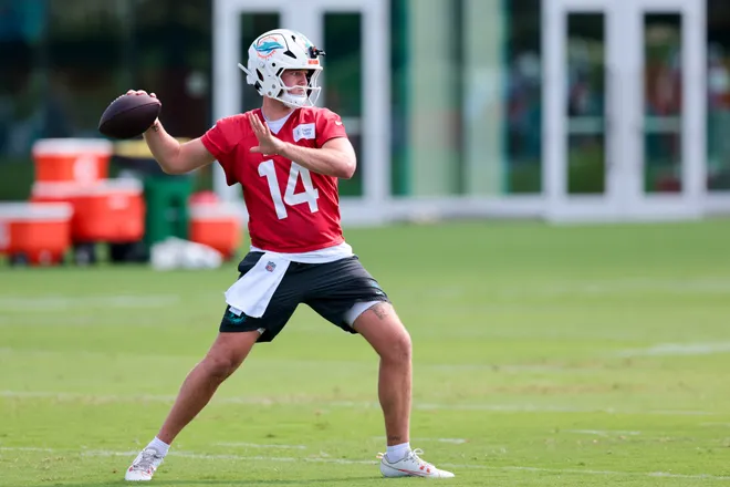 Jul 29, 2026; Miami Gardens, FL, USA; Miami Dolphins quarterback Quinn Ewers (14) works during practice at Baptist Health Training Complex. Mandatory Credit: Sam Navarro-Imagn Images