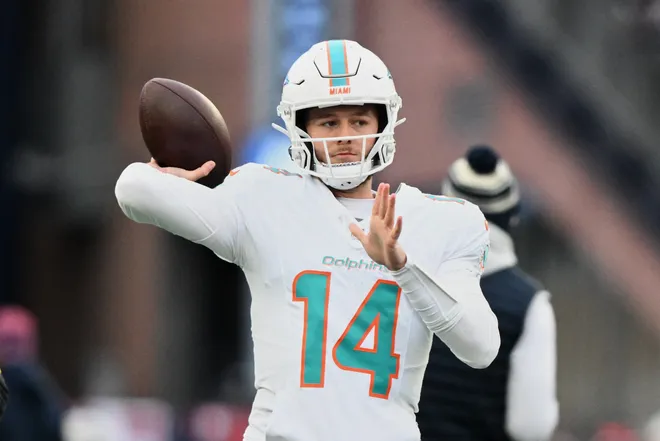 Jan 4, 2026; Foxborough, Massachusetts, USA; Miami Dolphins quarterback Quinn Ewers (14) throws a pass before the game against the New England Patriots at Gillette Stadium. Mandatory Credit: Brian Fluharty-Imagn Images