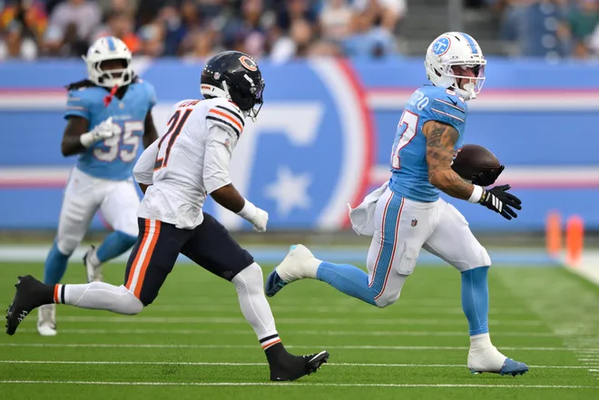 Aug 29, 2026; Nashville, Tennessee, USA;  Tennessee Titans wide receiver Xavier Restrepo (87) runs against Chicago Bears defensive back Cam Lewis (21) during the second quarter at Nissan Stadium.  Mandatory Credit: Steve Roberts-Imagn Images
