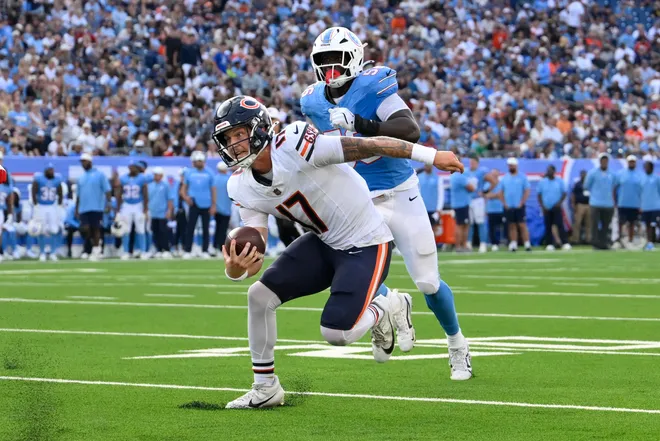 Aug 29, 2026; Nashville, Tennessee, USA;  Chicago Bears quarterback Tyson Bagent (17) runs against the Tennessee Titans during the second quarter at Nissan Stadium.  Mandatory Credit: Steve Roberts-Imagn Images