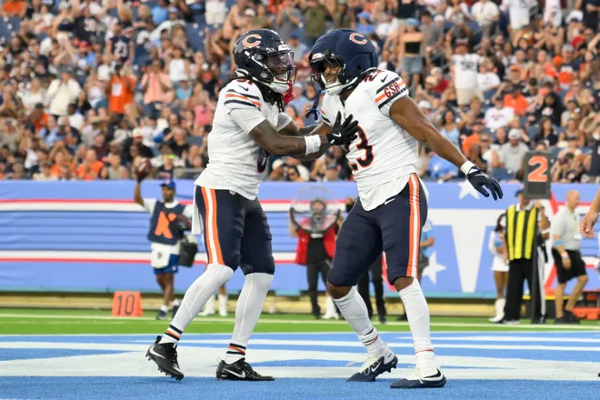 Aug 29, 2026; Nashville, Tennessee, USA;  Chicago Bears running back Roschon Johnson (23) celebrates with wide receiver Zavion Thomas (81) after scoring a touchdown against the Tennessee Titans during the third quarter at Nissan Stadium.  Mandatory Credit: Steve Roberts-Imagn Images
