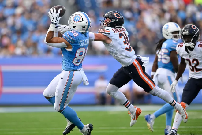Aug 29, 2026; Nashville, Tennessee, USA;  Tennessee Titans tight end Kylen Granson (86) makes a catch against Chicago Bears safety Dillon Thieneman (31) during the first quarter at Nissan Stadium.  Mandatory Credit: Steve Roberts-Imagn Images