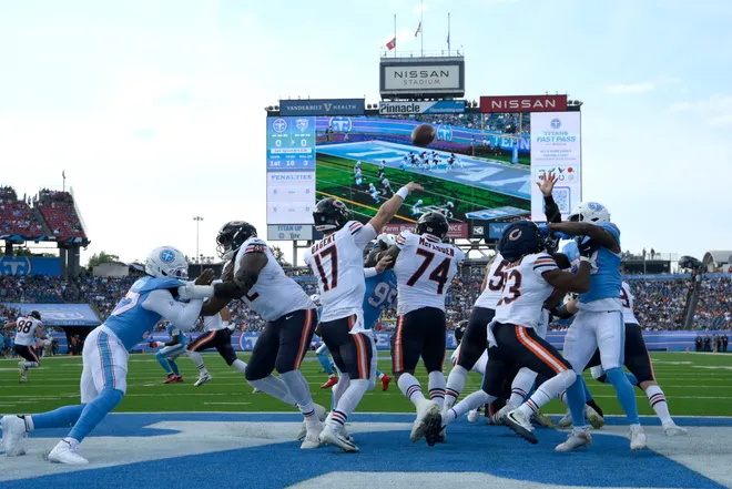 Aug 29, 2026; Nashville, Tennessee, USA;  Chicago Bears quarterback Tyson Bagent (17) throws a pass for a touchdown against the Tennessee Titans in the first quarter at Nissan Stadium.  Mandatory Credit: Steve Roberts-Imagn Images