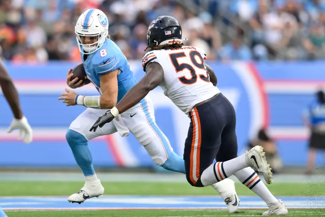 Aug 29, 2026; Nashville, Tennessee, USA;  Tennessee Titans quarterback Will Levis (8) runs against Chicago Bears defensive line Jamree Kromah (59) during the second quarter at Nissan Stadium.  Mandatory Credit: Steve Roberts-Imagn Images
