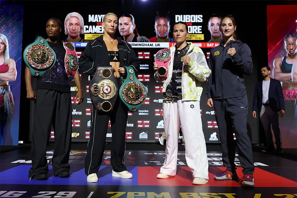 Cameron, Mayer, Dubois and Moore pose together with their world title belts after the MVPW-06 weigh-in