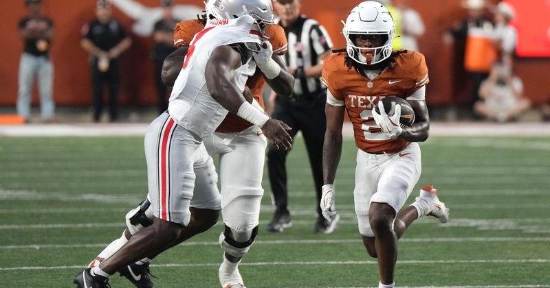 Sep 12, 2026; Austin, Texas, USA; Texas Longhorns running back Hollywood Smothers (2) runs against the Ohio State Buckeyes during the first half at Darrell K Royal-Texas Memorial Stadium. Mandatory Credit: Scott Wachter-Imagn Images | State