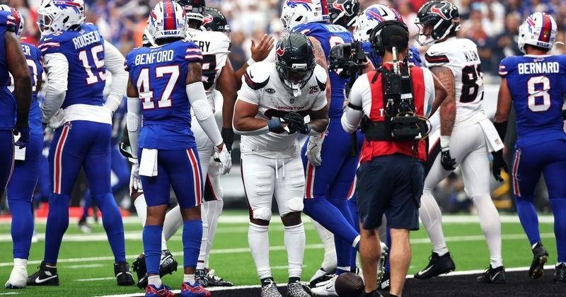Sep 13, 2026; Houston, Texas, USA; Houston Texans running back David Montgomery (32) celebrates after a touchdown during the first quarter against the Buffalo Bills at Reliant Stadium. Mandatory Credit: Troy Taormina-Imagn Images | State