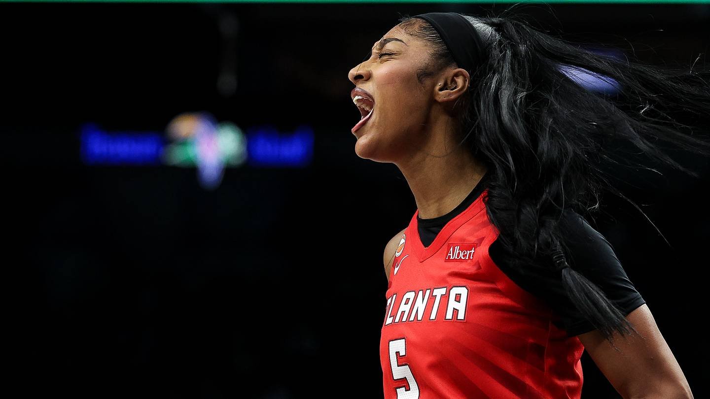 May 9, 2026; Minneapolis, Minnesota, USA; Atlanta Dream forward Angel Reese (5) celebrates a basket against the Minnesota Lynx during the first half at Target Center. Mandatory Credit: Matt Krohn-Imagn Images