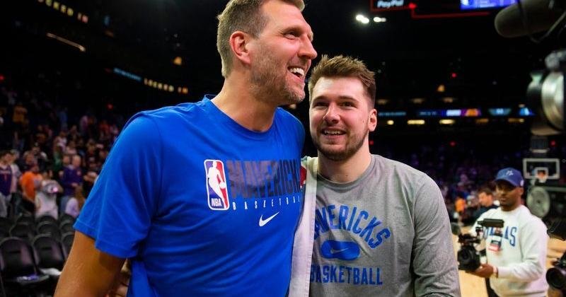 May 15, 2022; Phoenix, Arizona, USA; Dallas Mavericks oguard Luka Doncic (right) with former player Dirk Nowitzki against the Phoenix Suns in game seven of the second round for the 2022 NBA playoffs at Footprint Center. Mandatory Credit: Mark J. Rebilas-USA TODAY Sports | National