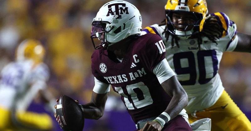 Sep 26, 2026; Baton Rouge, Louisiana, USA; Texas A&M Aggies quarterback Marcel Reed (10) scrambles under pressure during the third quarter against the LSU Tigers at Tiger Stadium. Mandatory Credit: Stephen Lew-Imagn Images | Texas