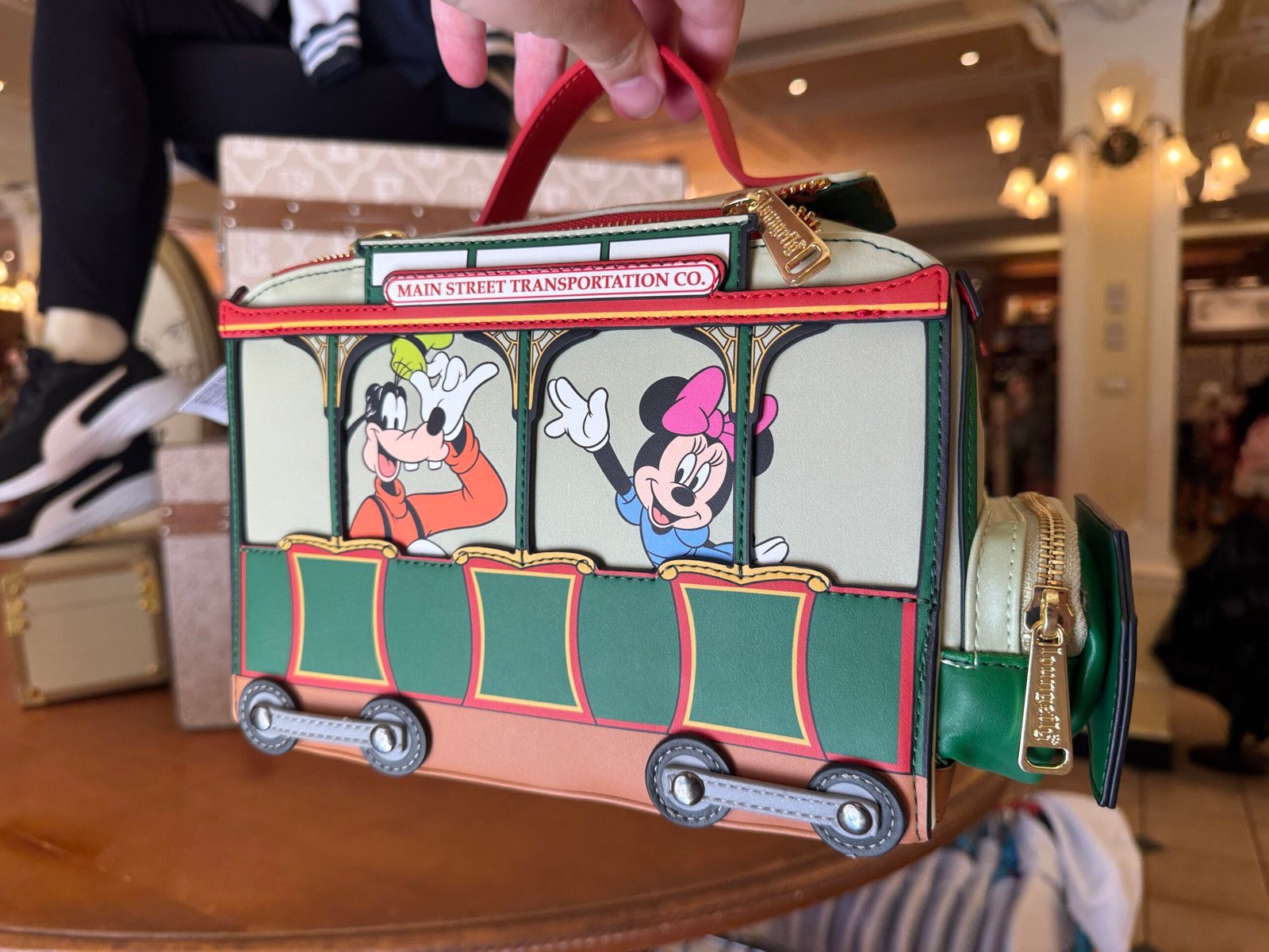 Main Street, U.S.A. trolley Loungefly bag featuring Minnie, Mickey, and more is now available at Magic Kingdom at Walt Disney World Resort