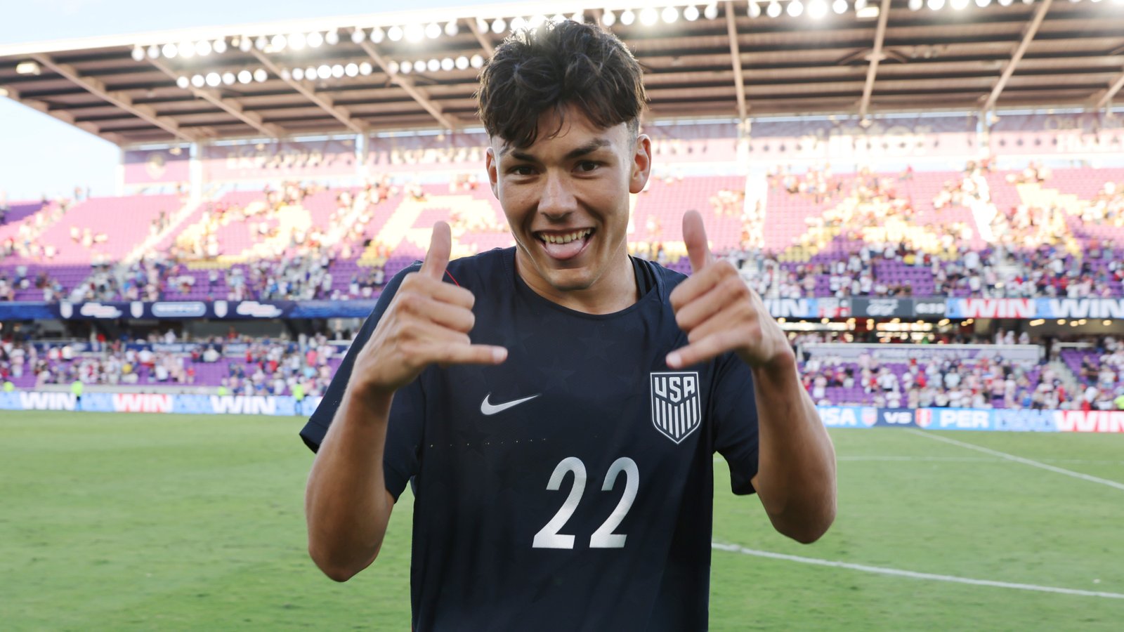 Justin Ellis of United States soccer tema celebrating, smiling.