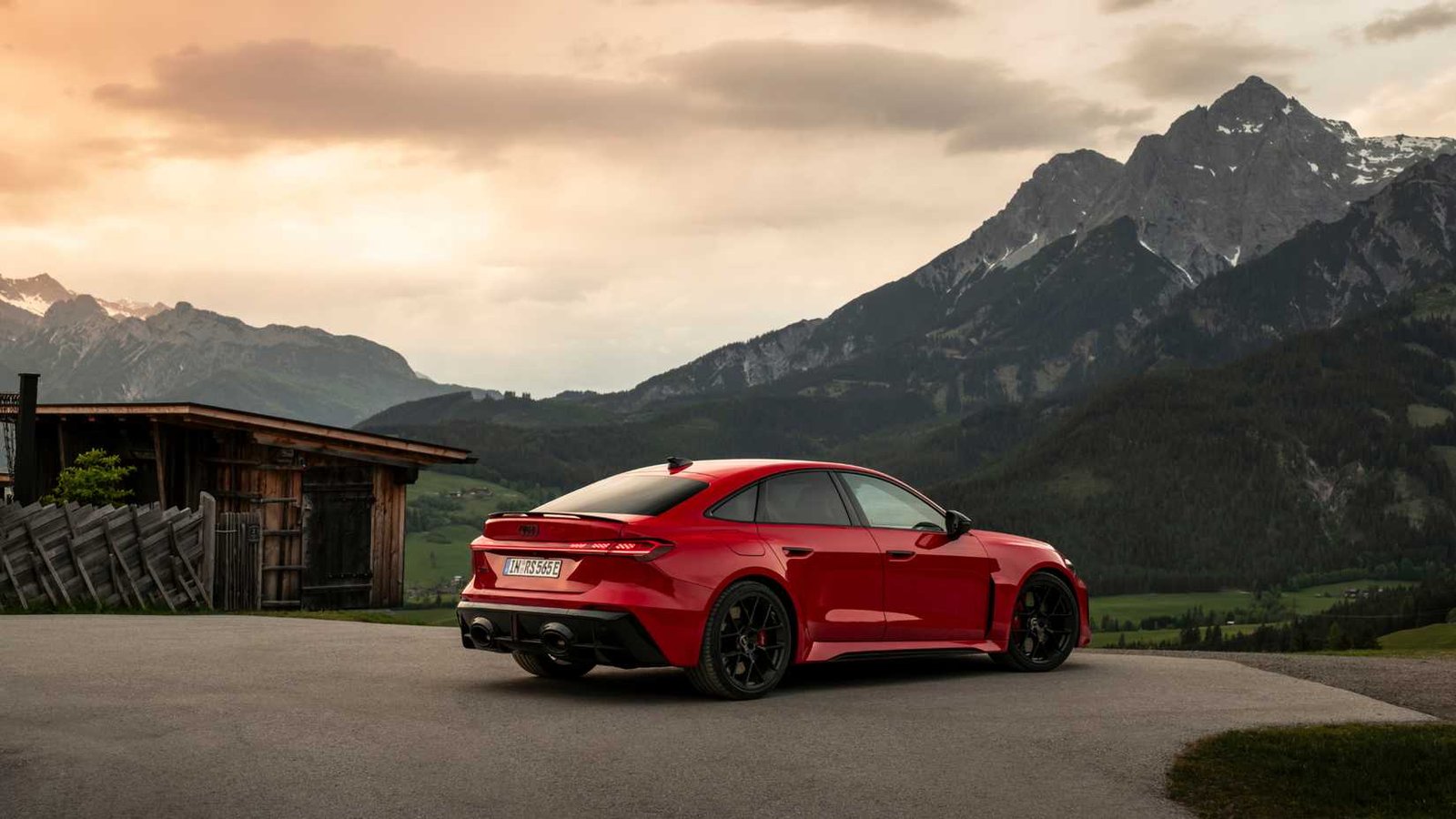 2027 Audi RS 5 Progressive Red Metallic static beauty shot Austrian Alps (2)
