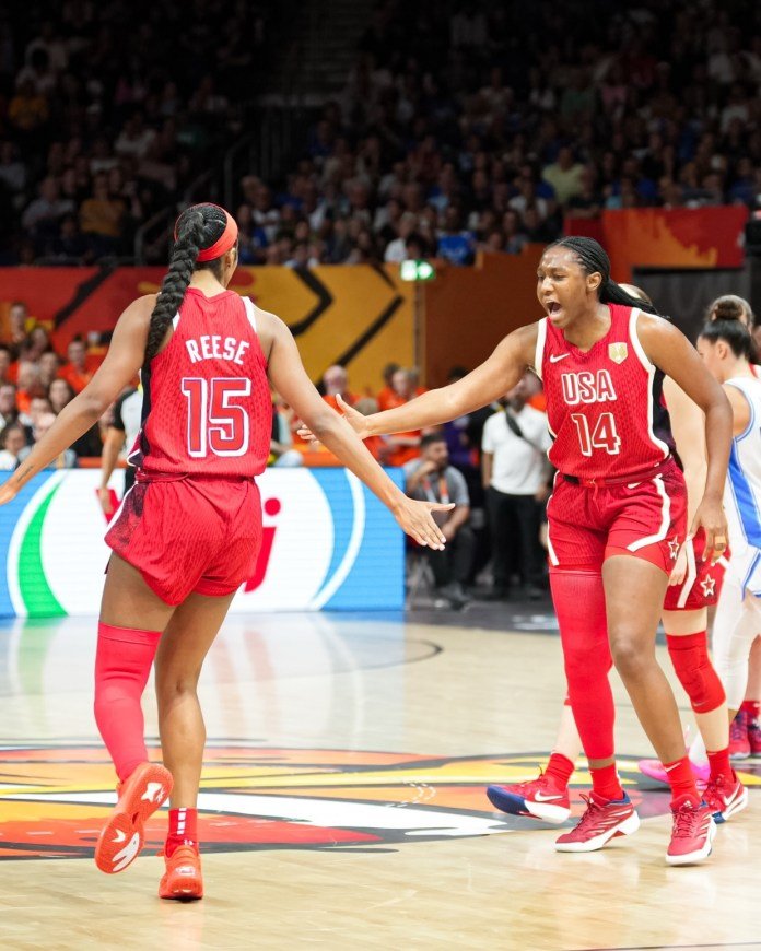 Angel Reese and Aliyah Boston celebrate on the court at the 2026 FIBA Women's Basketball World Cup. These players are essential to the success of the game