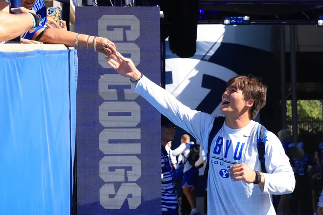 Sep 5, 2026; Provo, Utah, USA;  BYU Cougars quarterback Bear Bachmeier greets fans before the game against the Utah Tech Trailblazers at LaVell Edwards Stadium.  Mandatory Credit: Rob Gray-Imagn Images