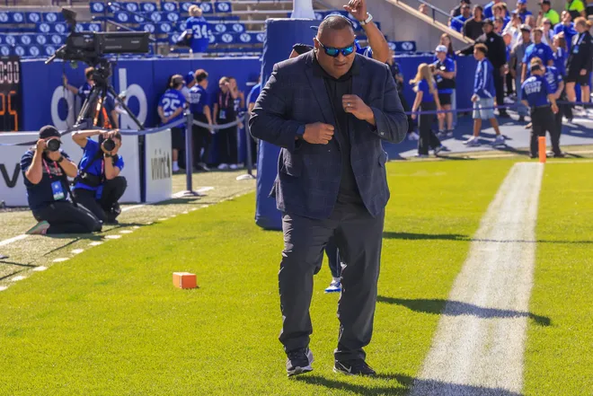 Sep 5, 2026; Provo, Utah, USA;  BYU Cougars head coach Kalani Sitake dances across the field upon arrival to Lavell Edwards Satdium before the game against the Utah Tech Trailblazers.  Mandatory Credit: Rob Gray-Imagn Images