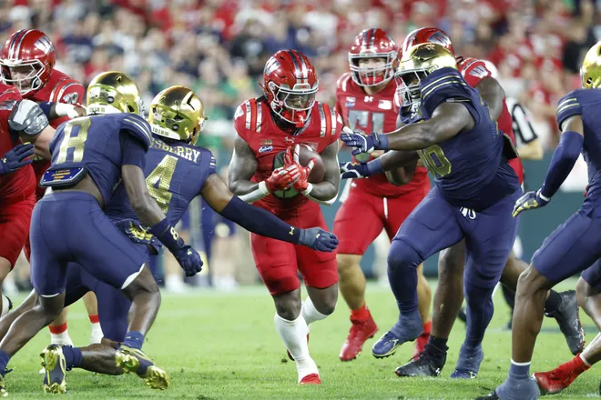 Sep 6, 2026; Green Bay, Wisconsin, USA;  Wisconsin Badgers running back Darrion Dupree (6) rushes the ball against the Notre Dame Fighting Irish in the second half at Lambeau Field.  Mandatory Credit: Michael Caterina-Imagn Images