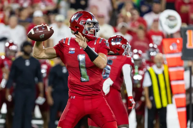 Sep 6, 2026; Green Bay, Wisconsin, USA;  Wisconsin Badgers quarterback Colton Joseph (1) drops back to pass in the first half against the Notre Dame Fighting Irish at Lambeau Field.  Mandatory Credit: Trevor Ruszkowski-Imagn Images