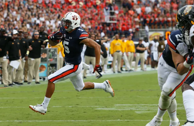 Sep 29, 2018; Auburn, AL, USA; Auburn Tigers receiver Anthony Schwartz (5) scores a touchdown against the Southern Miss Golden Eagles during the second quarter at Jordan-Hare Stadium. Mandatory Credit: John Reed-USA TODAY Sports