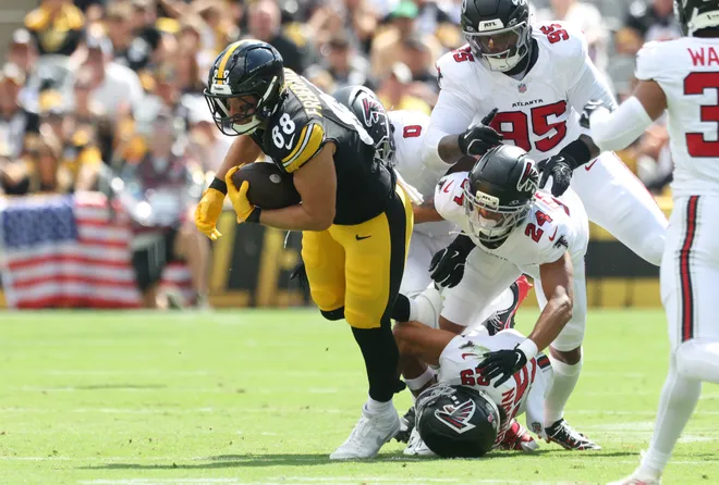 Sep 13, 2026; Pittsburgh, Pennsylvania, USA;  Pittsburgh Steelers tight end Pat Freiermuth (88) is tackled by Atlanta Falcons cornerback A.J. Terrell Jr. (24) and defensive back Sydney Brown (29) during the first quarter at Acrisure Stadium.  Mandatory Credit: Charles LeClaire-Imagn Images