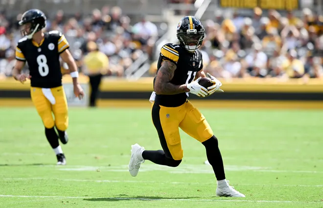 Sep 13, 2026; Pittsburgh, Pennsylvania, USA;  Pittsburgh Steelers wide receiver Michael Pittman Jr. (11) runs after a catch during the first quarter against the Atlanta Falcons at Acrisure Stadium.  Mandatory Credit: Barry Reeger-Imagn Images