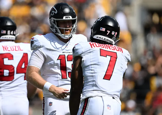 Sep 13, 2026; Pittsburgh, Pennsylvania, USA;  Atlanta Falcons quarterback Cooper Rush (13) celebrates with running back Bijan Robinson (7) after a touchdown during the first quarter against the Pittsburgh Steelers at Acrisure Stadium.  Mandatory Credit: Barry Reeger-Imagn Images