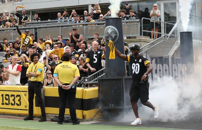 Sep 13, 2026; Pittsburgh, Pennsylvania, USA;  Former Pittsburgh Steelers player Plaxico Burress waves a terrible towel before a game Atlanta Falcons at Acrisure Stadium.  Mandatory Credit: Charles LeClaire-Imagn Images