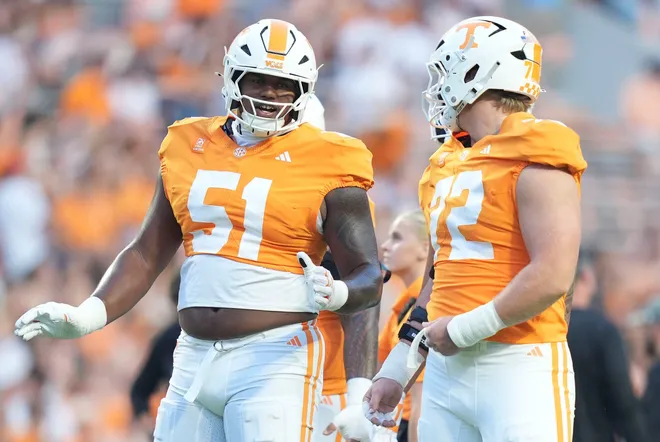 Tennessee linebacker TJ White (51) and Tennessee offensive lineman Jesse Perry (72) before the game between Tennessee and Kennesaw State at Neyland Stadium in Knoxville, Tenn., Sept. 19, 2026.