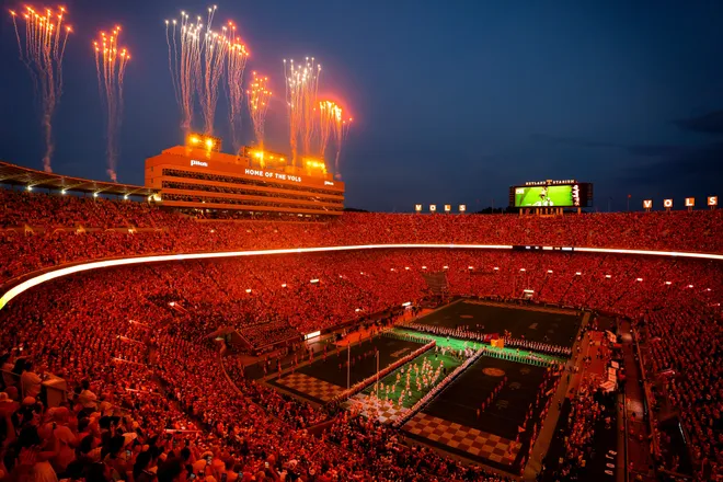 Fireworks go off as the Tennessee football team runs through the Power T before Tennessee’s college football game against Kennesaw State at Neyland Stadium in Knoxville on Sept. 19, 2026.