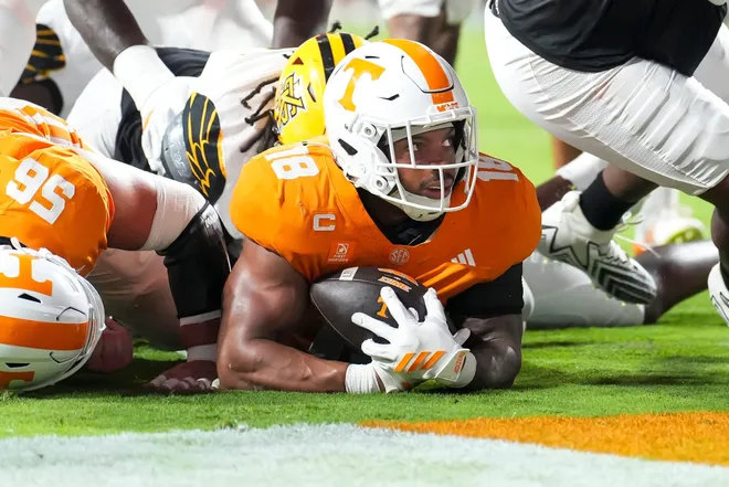 Tennessee running back DeSean Bishop (18) looks up after landing in the end zone for a touchdown during Tennessee’s college football game against Kennesaw State at Neyland Stadium in Knoxville on Sept. 19, 2026.
