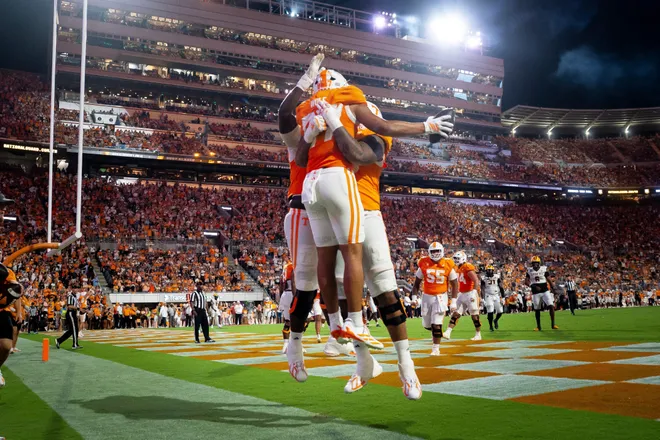 Tennessee tight end Luca Wolf (87) celebrates with teammates after getting the two-point conversion during Tennessee’s college football game against Kennesaw State at Neyland Stadium in Knoxville on Sept. 19, 2026.