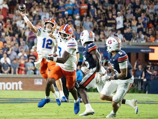 Florida Gators quarterback Aaron Philo (12) throws the ball as Auburn Tigers take on Florida Gators at Jordan-Hare Stadium in Auburn, Ala. on Saturday, Sept. 19, 2026. Florida Gators lead Auburn Tigers 20-17 at halftime.
