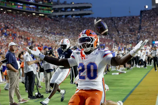 Sep 19, 2026; Auburn, Alabama, USA;  Florida Gators running back Duke Clark (20) celebrates after scoring a touchdown against the Auburn Tigers during the second quarter at Jordan-Hare Stadium.  Mandatory Credit: John Reed-Imagn Images