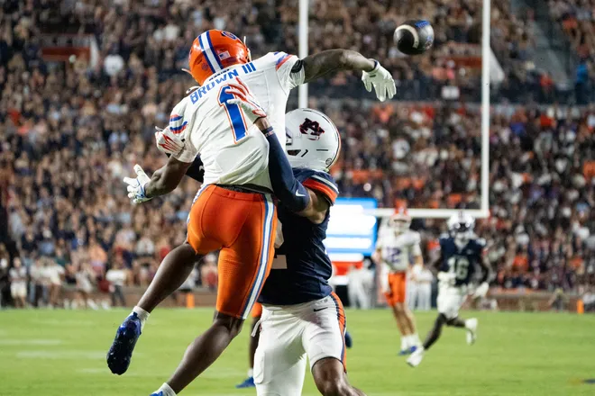 Auburn Tigers defensive back Andre Jordan Jr. (22) is called for defensive pass interference on Florida Gators wide receiver Vernell Brown III (1) as Auburn Tigers take on Florida Gators at Jordan-Hare Stadium in Auburn, Ala. on Saturday, Sept. 19, 2026. Florida Gators lead Auburn Tigers 20-17 at halftime.