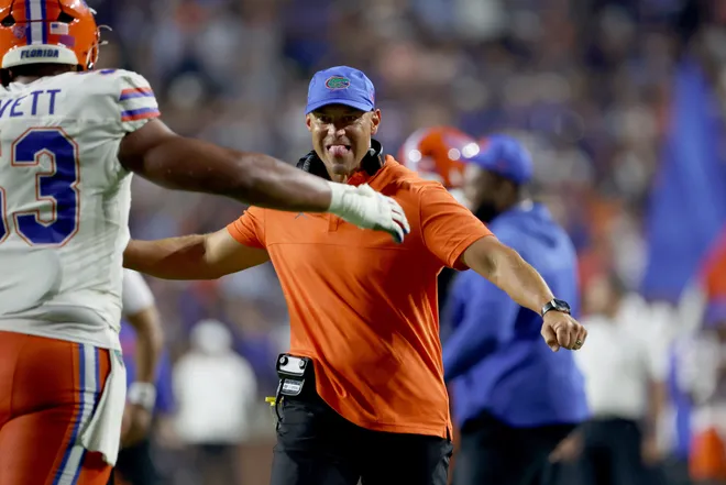 Sep 19, 2026; Auburn, Alabama, USA;  Florida Gators head coach Jon Sumrall celebrates with offensive lineman Bryce Lovett (53) after the Gators scored a touchdown during the fourth quarter against the Auburn Tigers at Jordan-Hare Stadium.  Mandatory Credit: John Reed-Imagn Images