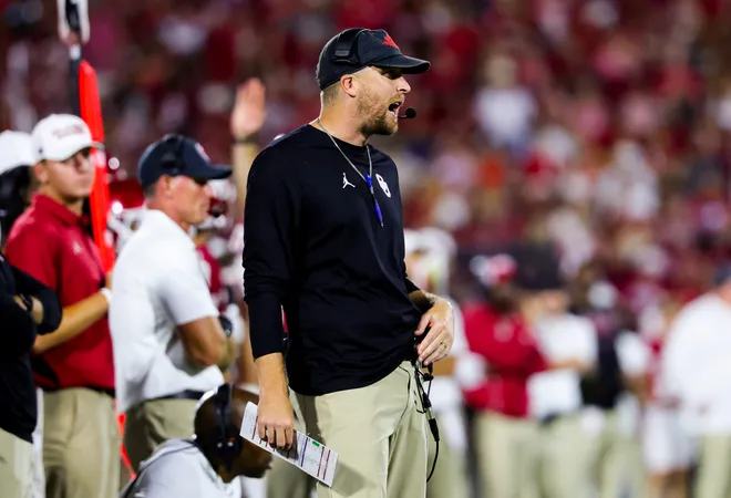Sep 19, 2026; Norman, Oklahoma, USA; Oklahoma Sooners offensive coordinator Ben Arbuckle reacts during the second half against the New Mexico Lobos at Gaylord Family-Oklahoma Memorial Stadium. Mandatory Credit: Kevin Jairaj-Imagn Images