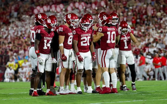 Sep 19, 2026; Norman, Oklahoma, USA; Oklahoma Sooners quarterback John Mateer (10) calls a play in the huddle during the second half against the New Mexico Lobos at Gaylord Family-Oklahoma Memorial Stadium. Mandatory Credit: Kevin Jairaj-Imagn Images