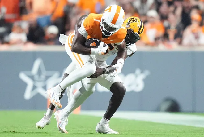 Sept. 19, 2026; Knoxville, Tennessee; Tennessee wide receiver Travis Smith Jr. (1) is tackled during a game between Tennessee and Kennesaw State at Neyland Stadium in Knoxville, Tennessee on Sept. 19, 2026.