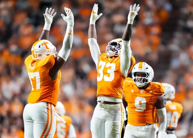 Sept. 19, 2026; Knoxville, Tennessee; Tennessee defensive lineman Ethan Utley (17) and Tennessee defensive lineman Jordan Norman (33) celebrate a play during Tennessee's college football game against Kennesaw State at Neyland Stadium in Knoxville on Sept. 19, 2026.