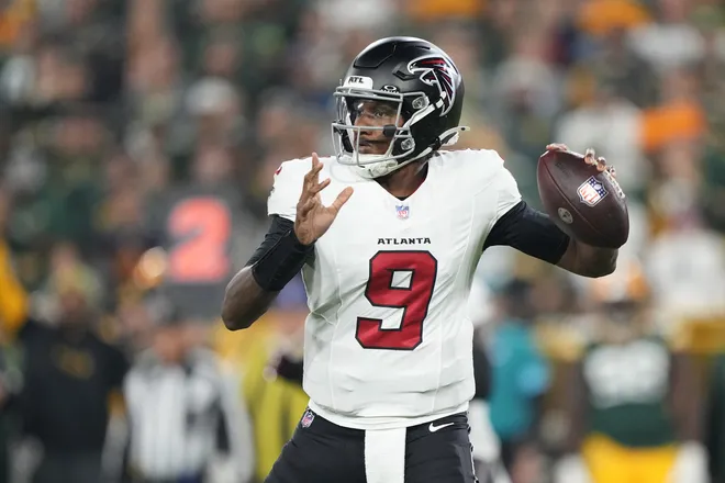 Sep 24, 2026; Green Bay, Wisconsin, USA;  Atlanta Falcons quarterback Michael Penix Jr. (9) looks to pass the ball during the first quarter against the Green Bay Packers at Lambeau Field.  Mandatory Credit: Jeff Hanisch-Imagn Images