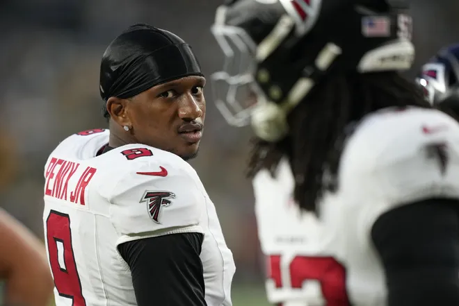 Sep 24, 2026; Green Bay, Wisconsin, USA;  Atlanta Falcons quarterback Michael Penix Jr. (9) looks on during warm up prior to the during the first half against the Green Bay Packers at Lambeau Field.  Mandatory Credit: Jeff Hanisch-Imagn Images